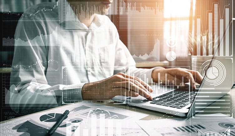 Headshot of male using sales compensation management solution and viewing reports Headshot of male using sales compensation management solution and viewing reports
